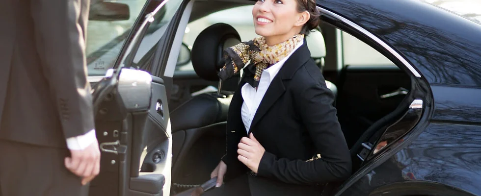 women coming out of the car