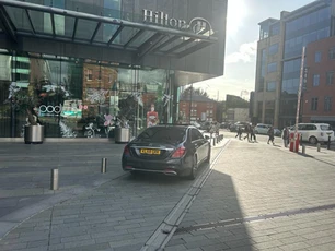 cars standing outside the building