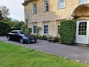 car standing outside the house