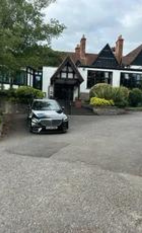 car standing outside the house