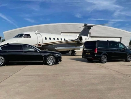 car standing near airplane