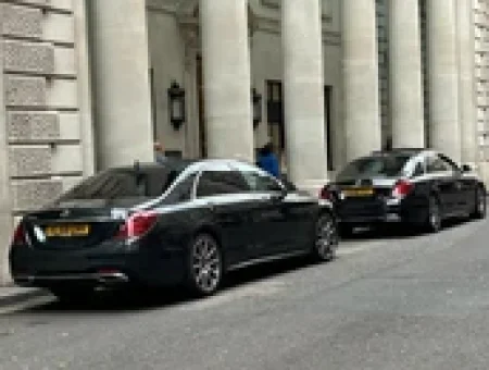 cars standing outside the building